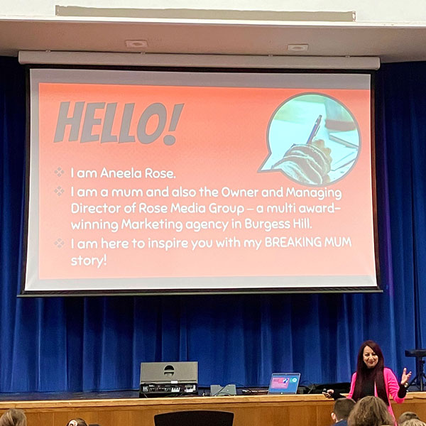 Aneela Rose giving a presentation