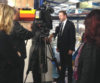 TR Fastenings Dave Fisk interview whilst Abi and Aneela (Rose Media Group) look on_close-up